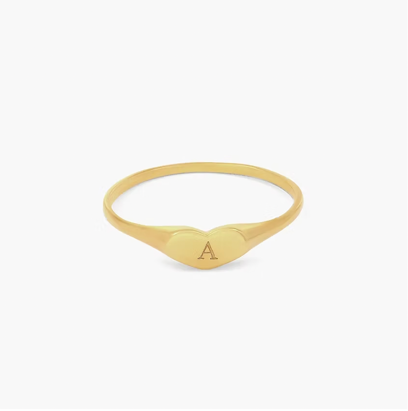 Gold ring with a heart-shaped engraving. Engraved Heart Signet Ring. gold.plated. rose gold. silver. gold. silver. rose gold. plated 18k solid sterling silver. makana jewellery jewelry