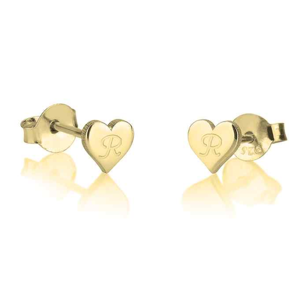 A pair of gold heart stud earrings, each engraved with a capital letter. Gold, Gold plated, rose gold plates, sterling silver 925, makana jewellery, jewelry, 18k, 22k Karat