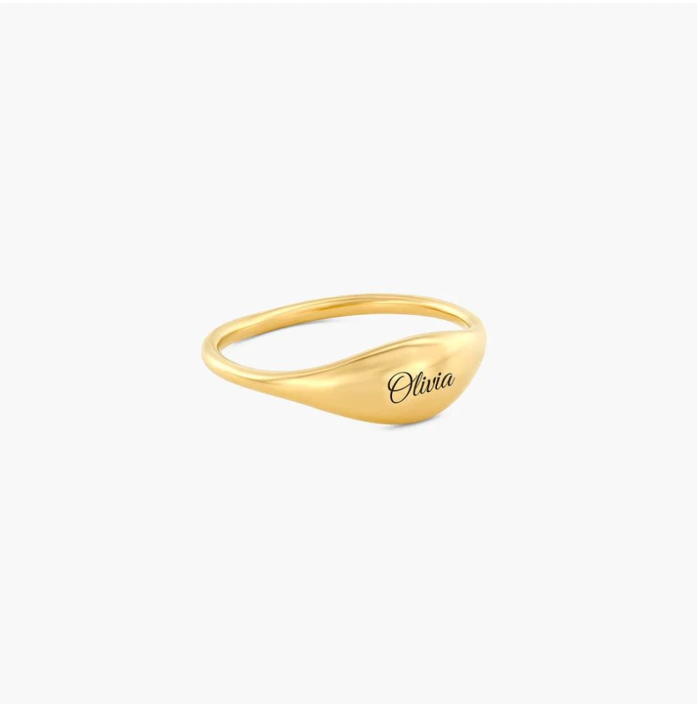 A polished gold signet ring engraved with the name in black cursive script, gold. rose gold. silver. plated. gold. silver. rose gold. plated 18k solid sterling silver. makana jewellery jewelry