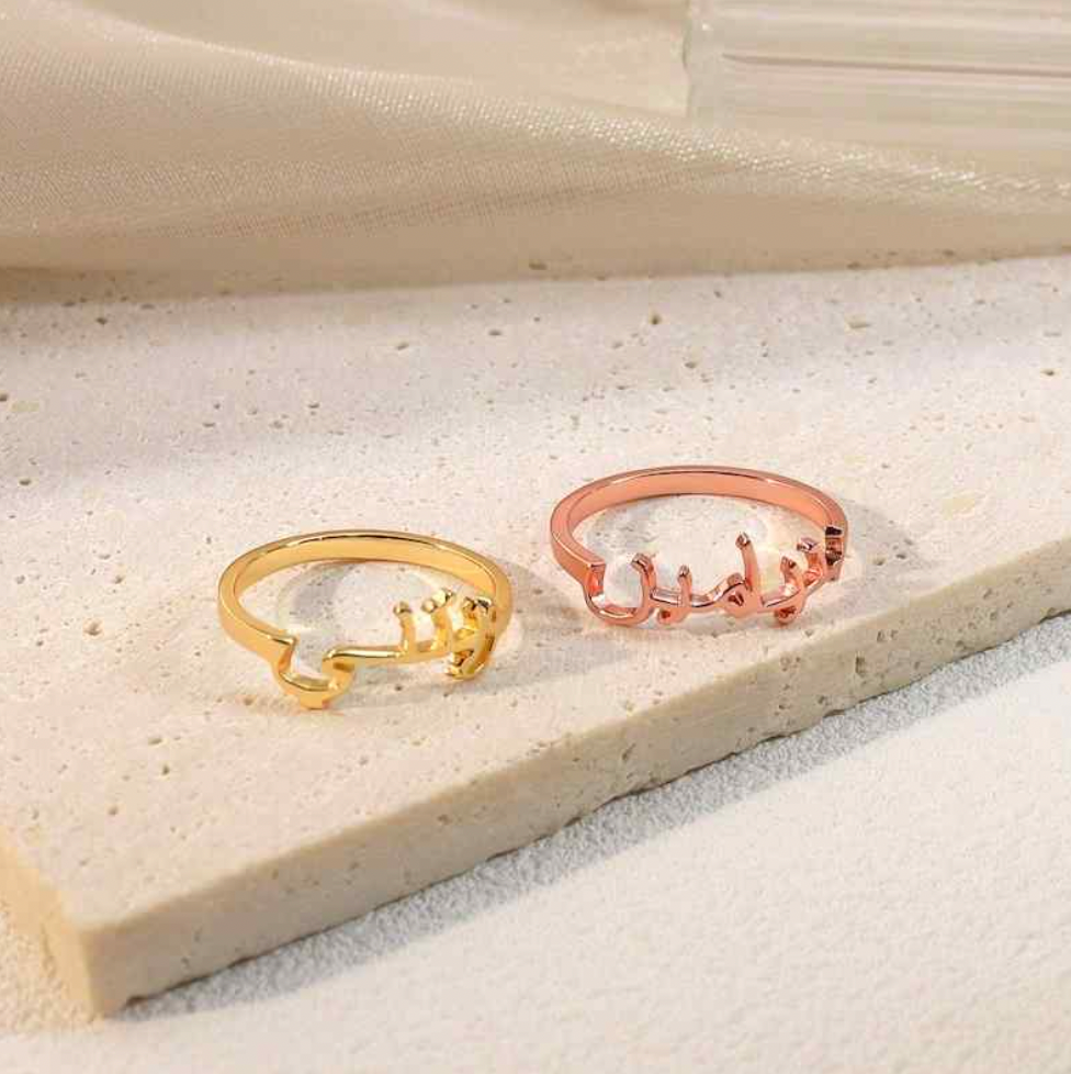 Two Arabic calligraphy ring  in gold and rose gold, gold.silver. rose gold. plated. gold. silver. rose gold. plated 18k solid sterling silver. makana jewellery jewelry
