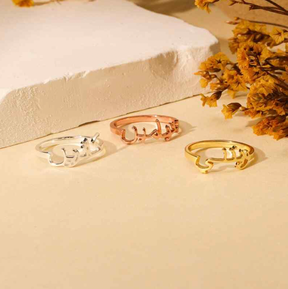 Three Arabic calligraphy name rings in silver, rose gold, gold.silver. rose gold. plated. gold. silver. rose gold. plated 18k solid sterling silver. makana jewellery jewelry