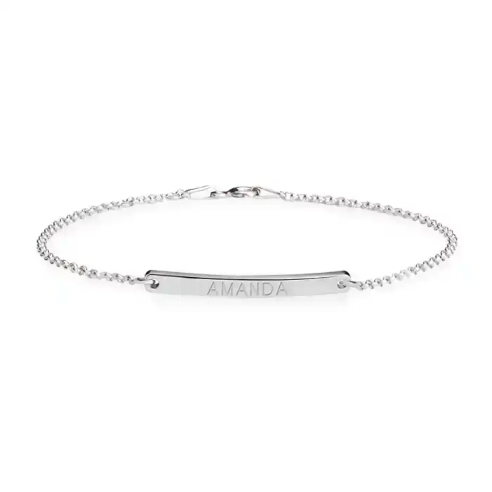 Silver bracelet with engraved message on a white background. gold plated, rose gold plated, sterling silver 925. makana jewelry, jewellery.